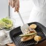 Silicone kitchen utensil set with wooden handle.