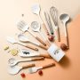 Silicone kitchen utensil set with wooden handle.